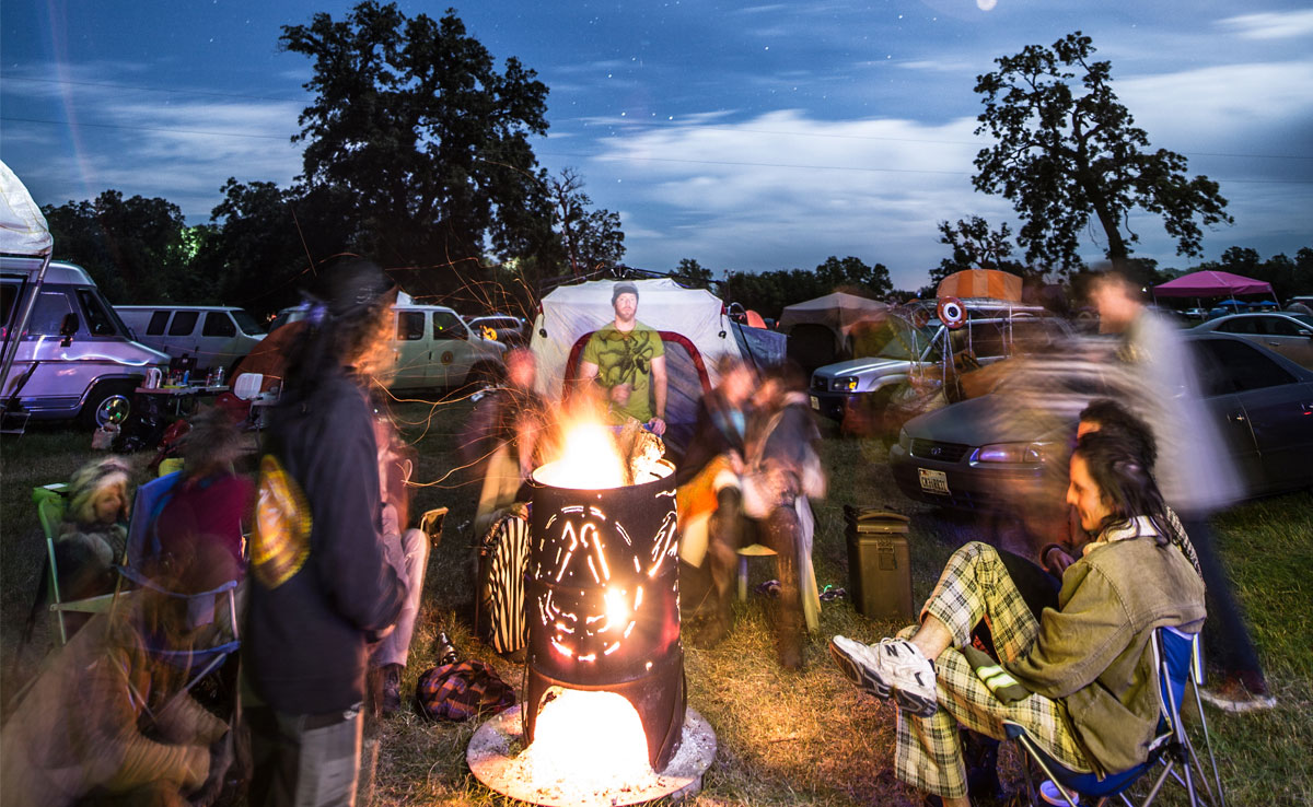 Picture of festival goers having a bonfire.