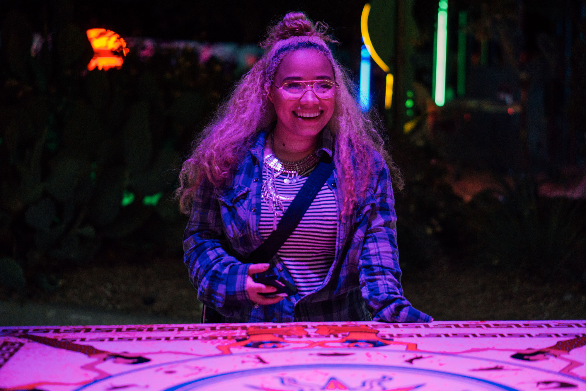 Picture of a person enjoying the festival.