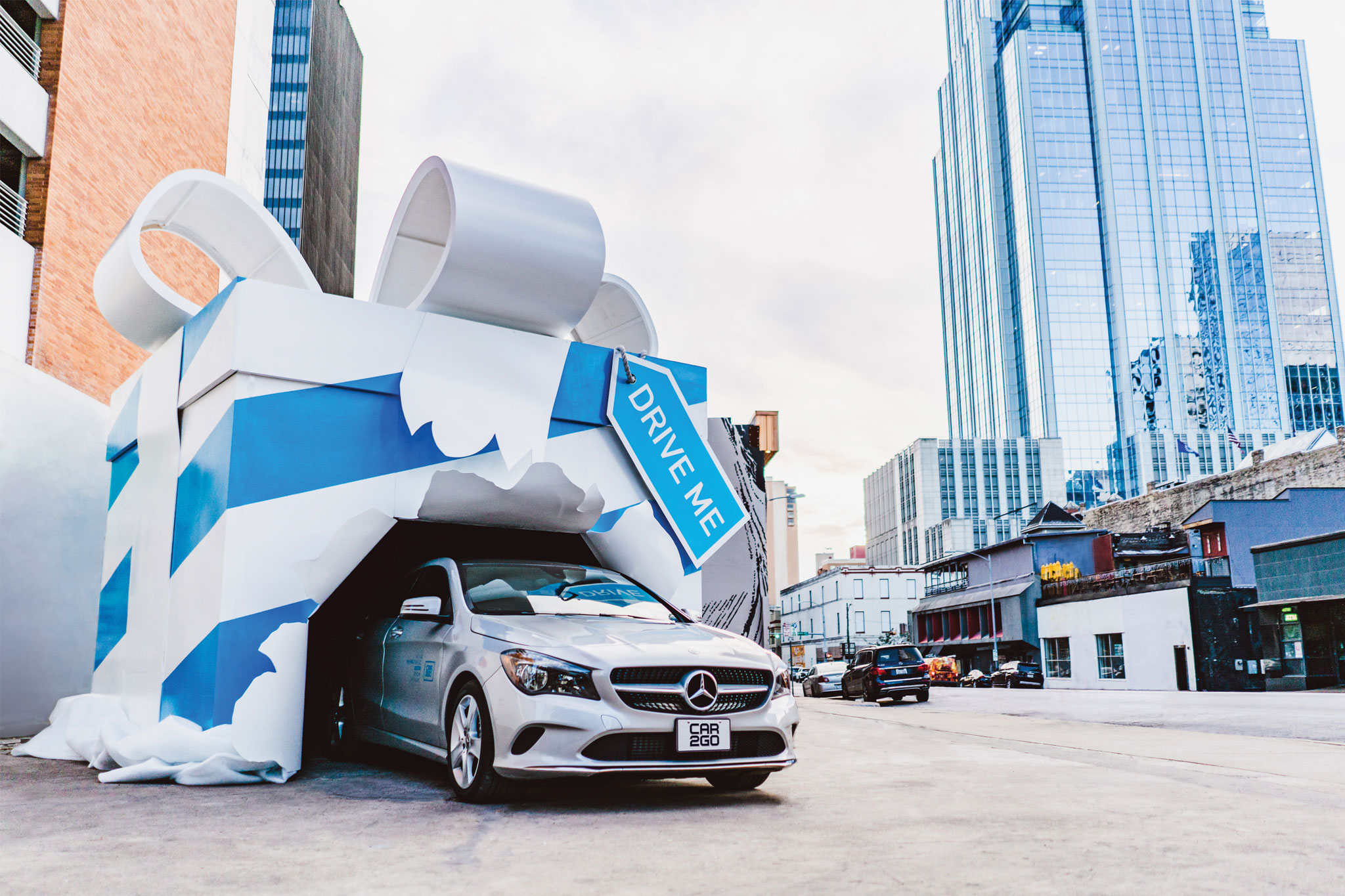 Picture of giant present box sculpture built for Car2Go.