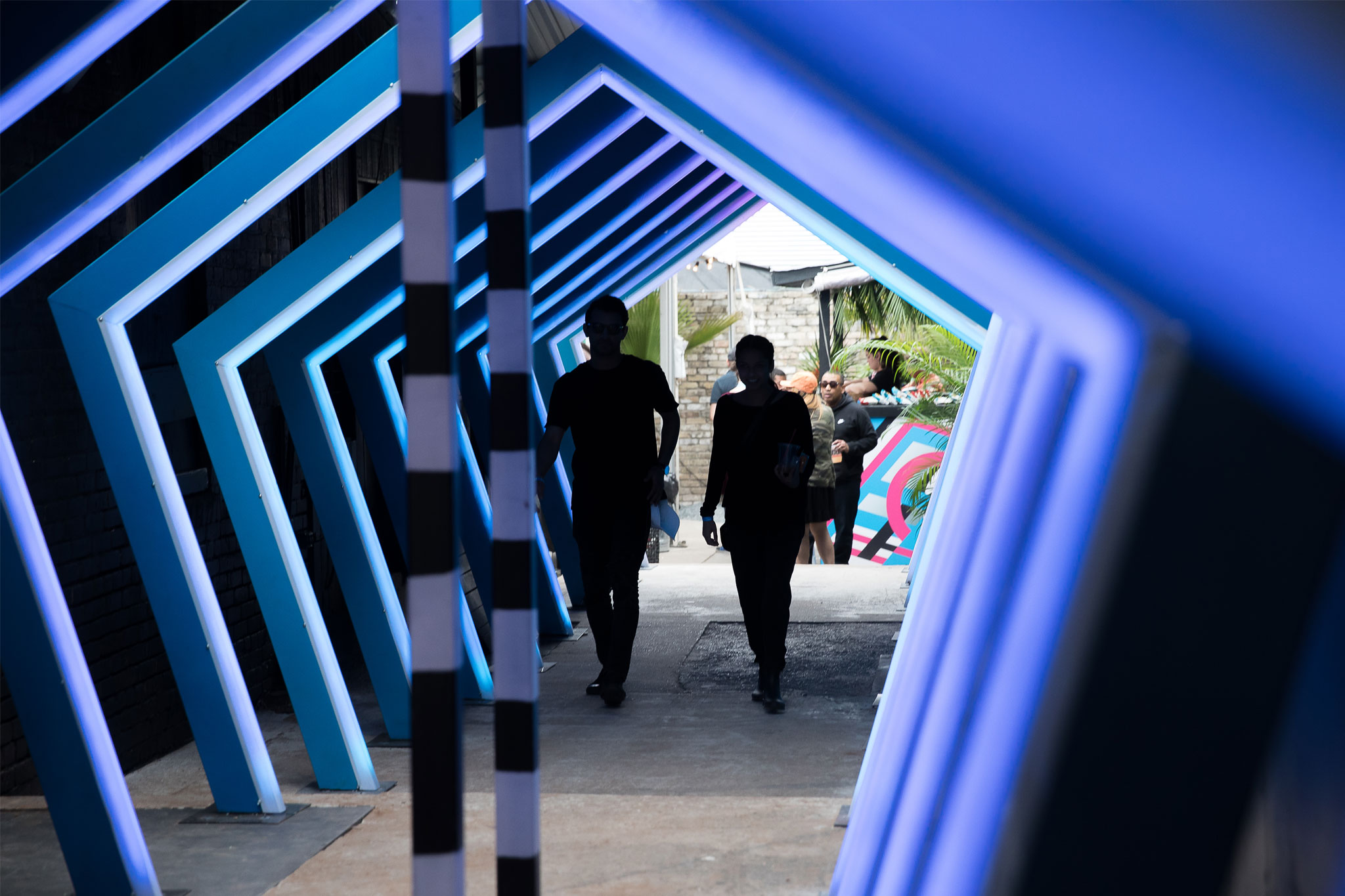 Picture of event attendees going through the LED exit tunnel.