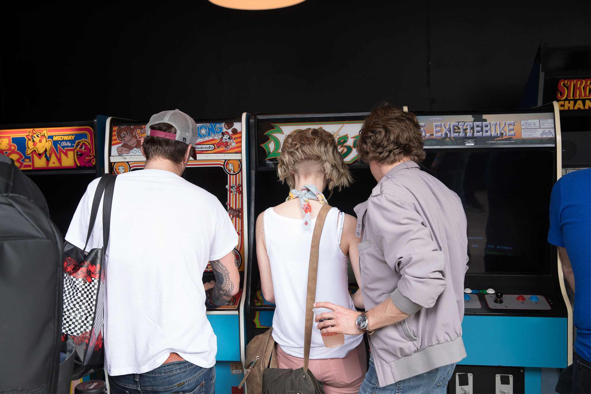 Picture of people enjoying the classic games at Mashable's SXSW event.