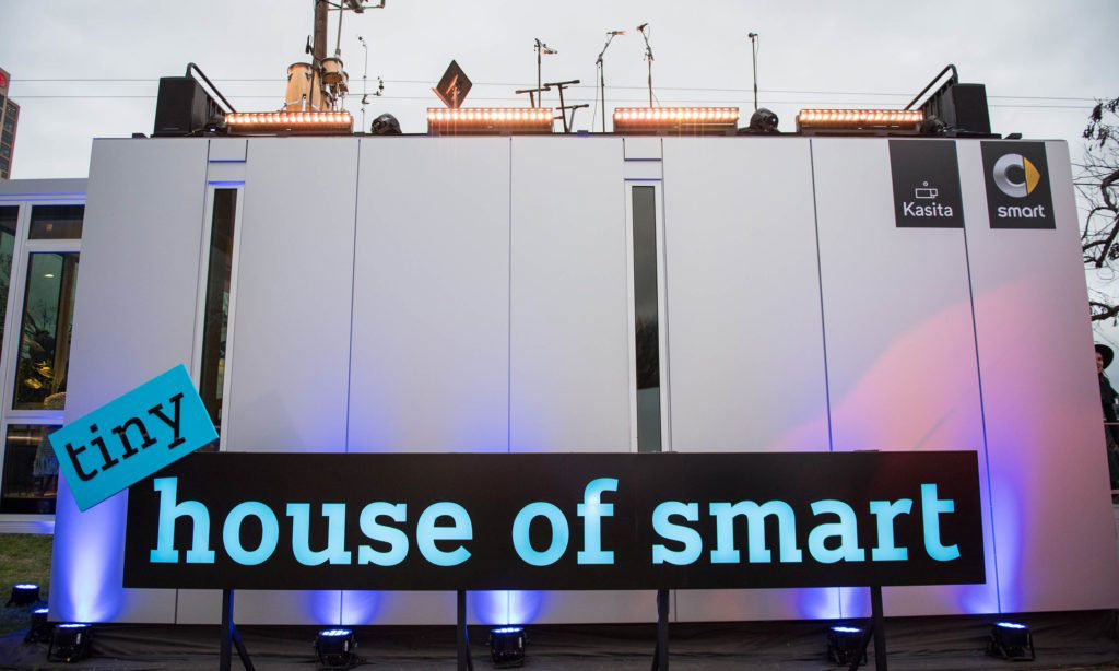 Picture of stage and signage for House of Smart.