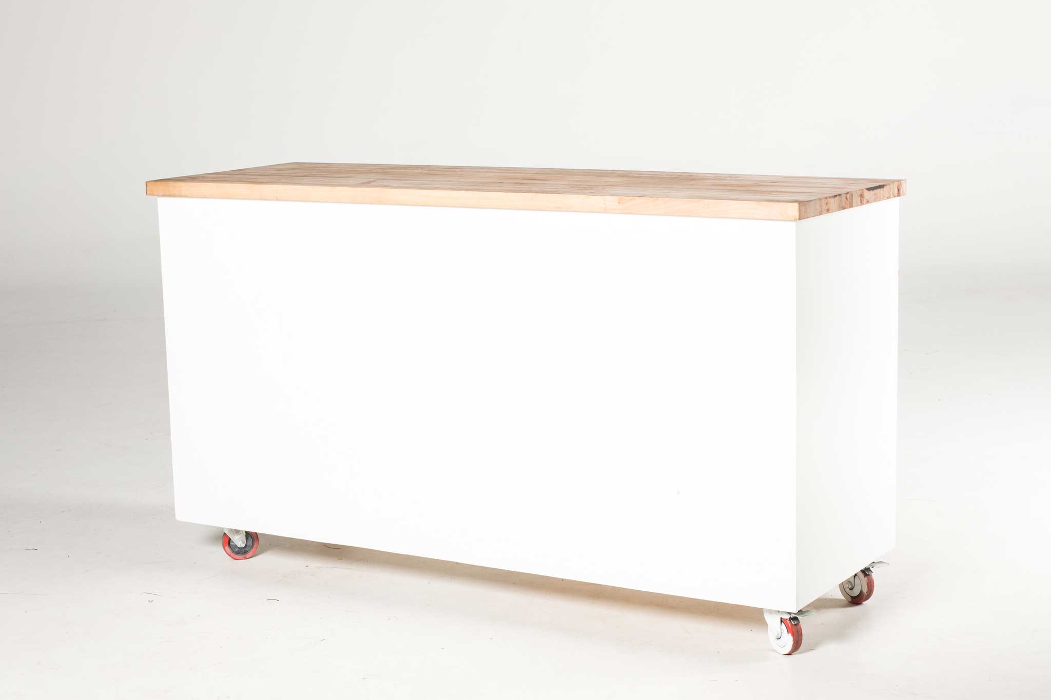 Picture of the white block bar rental on wheels.