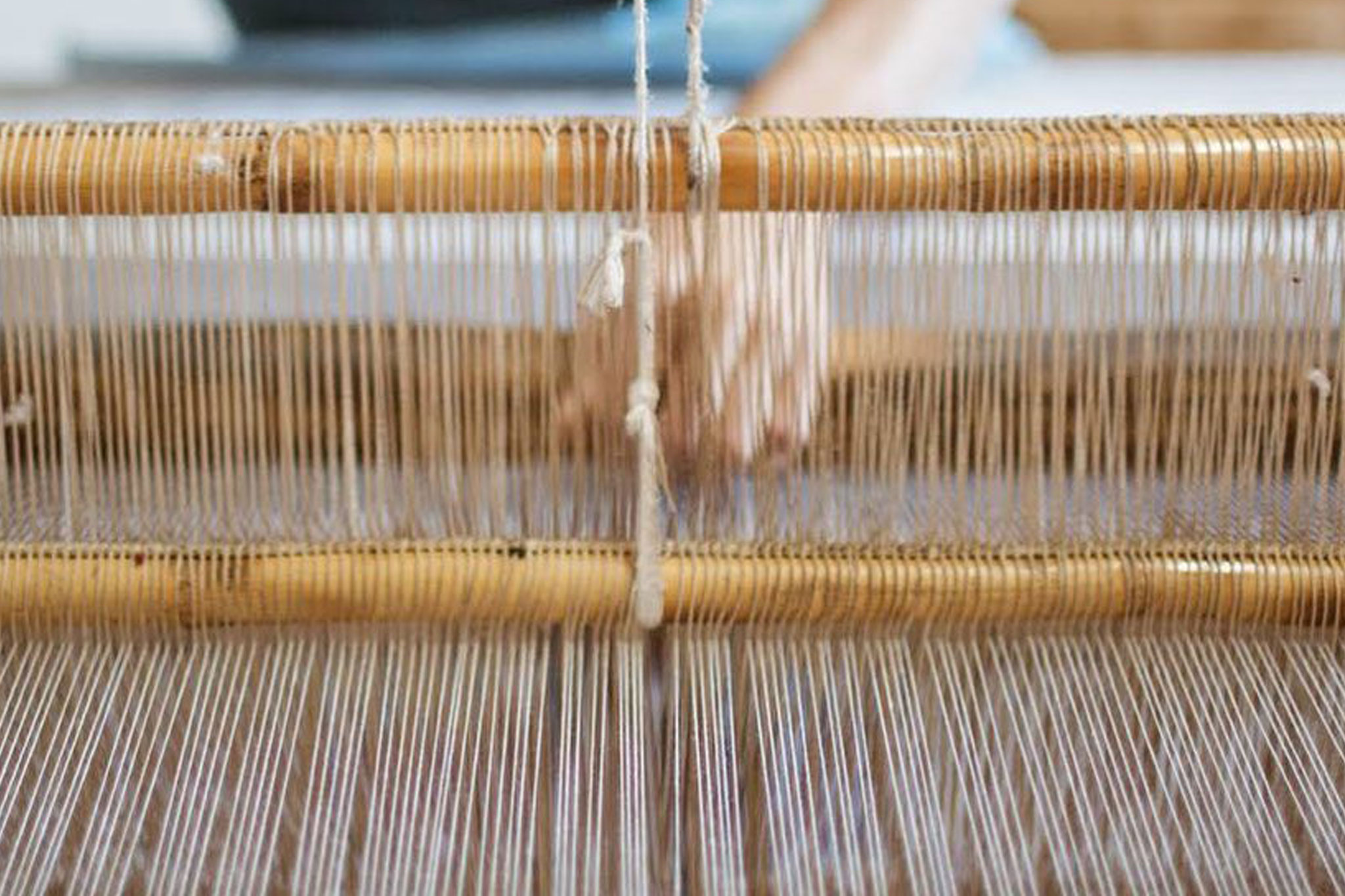 Picture of a loom at work.